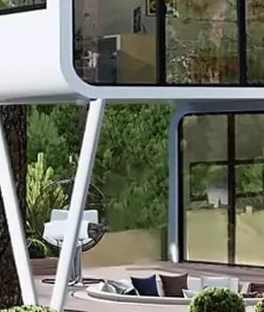 Aufgeständertes Modul über einer Terrasse mit Sitzgruppe
